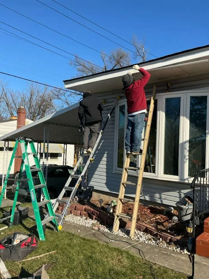 Restoration crew performing exterior repair in Perry